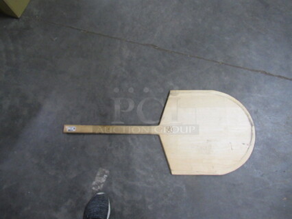 One Wooden Pizza Paddle.