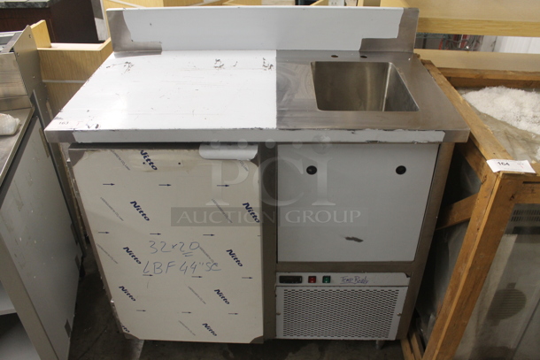 BRAND NEW SCRATCH AND DENT! Stainless Steel Commercial Single Door Work Top Cooler w/ Sink Basin, Back Splash and Door. Bay 11x15x11. Tested and Working! - Image 1 of 6