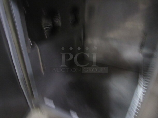One Stainless Steel  Kelvinator 3 Door Refrigerated Prep Table With 3 Racks On Casters. Model# KCPT92.12. 92X33X42 - Image 3 of 3
