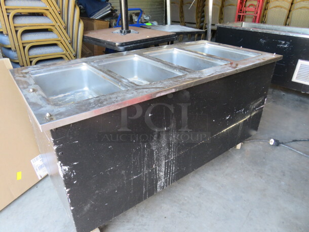 One Vollrath 4 Weel Steam Table On Casters. 60X28X36.