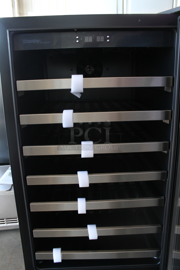 BRAND NEW SCRATCH AND DENT! Danby DWC458BLS Designer Series Metal Wine Cooler / Wine Cellar Merchandiser with 45 Bottle Capacity, 7 Slide-Out Wooden Racks, Blue LED Lighting and Tempered Glass Door. 115 Volts, 1 Phase. Tested and Working!
 - Image 2 of 5