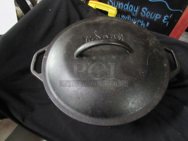 One Lodge 10 Inch Cast Iron Baking Pot With Lid.