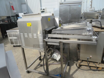 One Belshaw Admatic Thermoglaze On Casters. Model# TG50. 208 Volt. 1 Phase. 34X87X58
