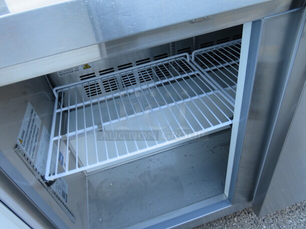 One WORKING Avantco 2 Door Worktop Refrigerator With 2 Racks On Casters. Model# 178AWT48RHC. 115 Volt. 48X30X39 - Image 2 of 3