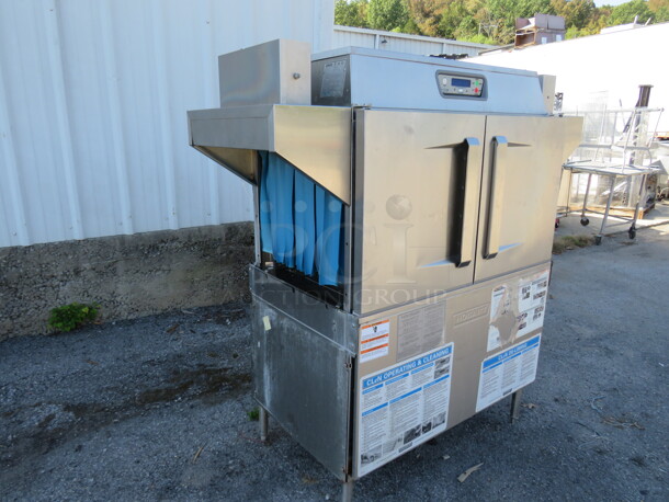 One WORKING Hobart Conveyor High Temp Dishwasher. Model# CL44ENER. 208 Volt 3 Phase. 58X31.5X80. $39,190.69.  - Image 2 of 4