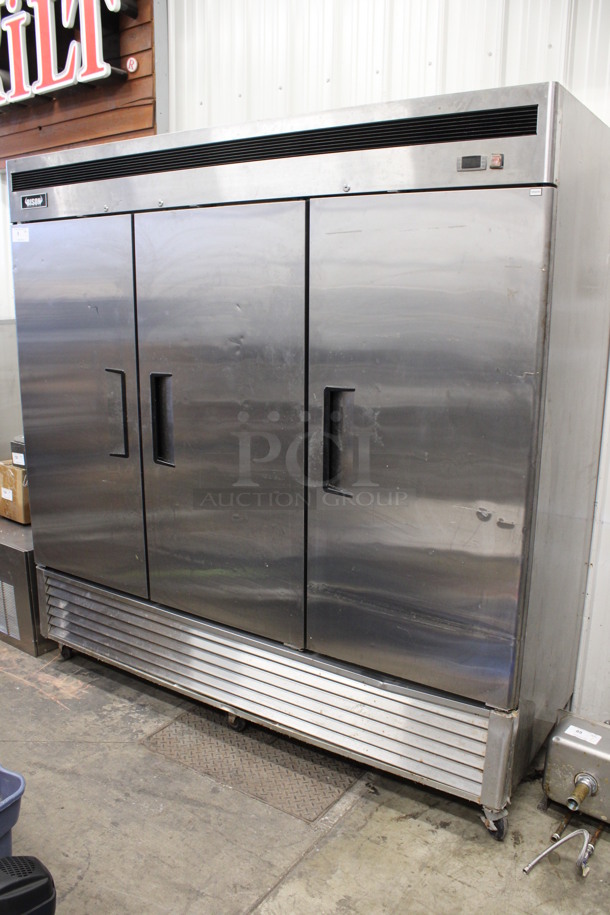 2014 Bison Model MBF8508 Stainless Steel Commercial 3 Door Reach In Cooler w/ Poly Coated Racks on Commercial Casters. 115 Volts, 1 Phase. 82x32x83. Tested and Working!