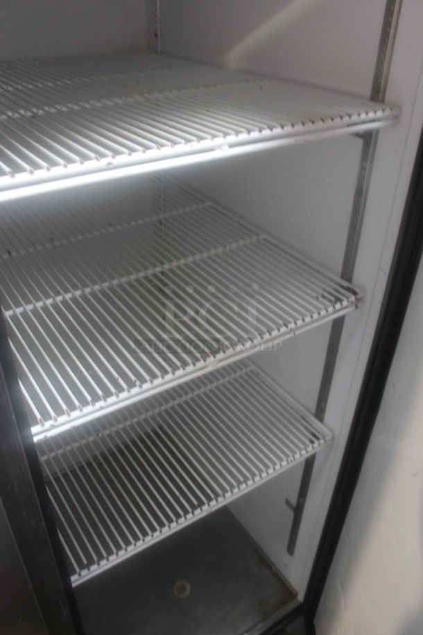2012 True TG2R-2S ENERGY STAR Stainless Steel Commercial Two Door Reach In Cooler w/ Poly Coated Racks on Commercial Casters. 115 Volts, 1 Phase. Tested and Working! - Image 4 of 5