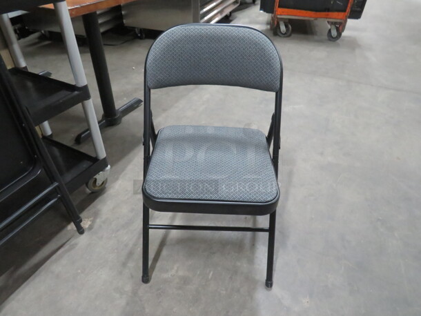 Black Metal Folding Chair With Cushioned Seat/Back. 2XBID - Image 1 of 2
