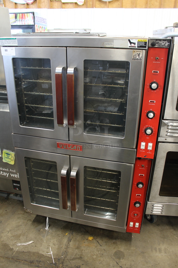 2 Vulcan ET88B Stainless Steel Commercial Electric Powered Full Size Convection Ovens w/ View Through Doors, Metal Oven Racks and Thermostatic Controls. 480 Volts, 3 Phase. 2 Times Your Bid! 
