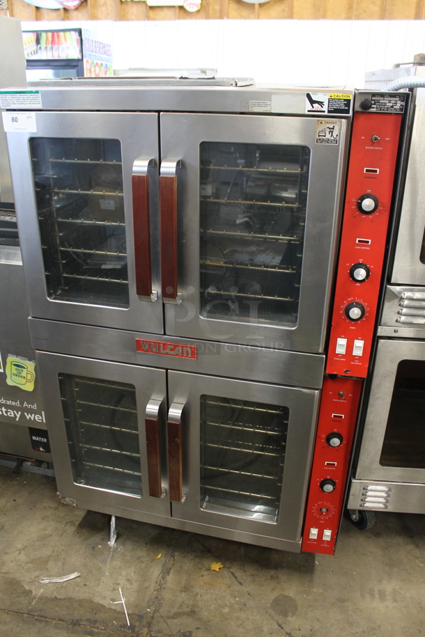 2 Vulcan ET88B Stainless Steel Commercial Electric Powered Full Size Convection Ovens w/ View Through Doors, Metal Oven Racks and Thermostatic Controls. 480 Volts, 3 Phase. 2 Times Your Bid!  - Image 1 of 7