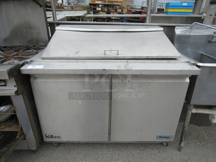 One Centaur Plus 2 Door Refrigerated Prep Table With 2 Racks On Casters. Model# CST-48-18-HC. 115 Volt. 48X32X45. WORKING!!!!