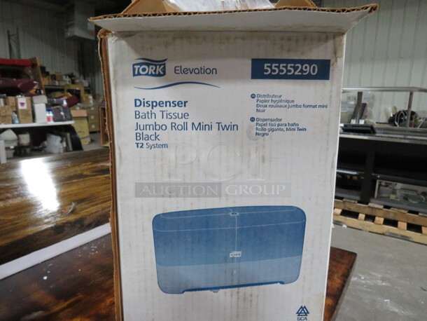 One NEW Tork Jumbo Roll Twin Toilet Paper Dispenser. #5555290. - Image 1 of 1