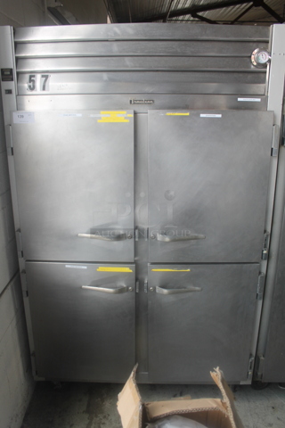 Traulsen G20000 Stainless Steel Commercial 4 Half Size Door Reach In Cooler on Commercial Casters. 115 Volts, 1 Phase. Cannot Test Due To Plug Style