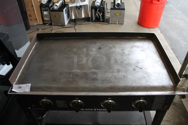 Black Stone 1554 Metal Portable Propane Gas Powered Catering Flat Top Griddle on Commercial Casters w/ Cover.  - Image 4 of 9