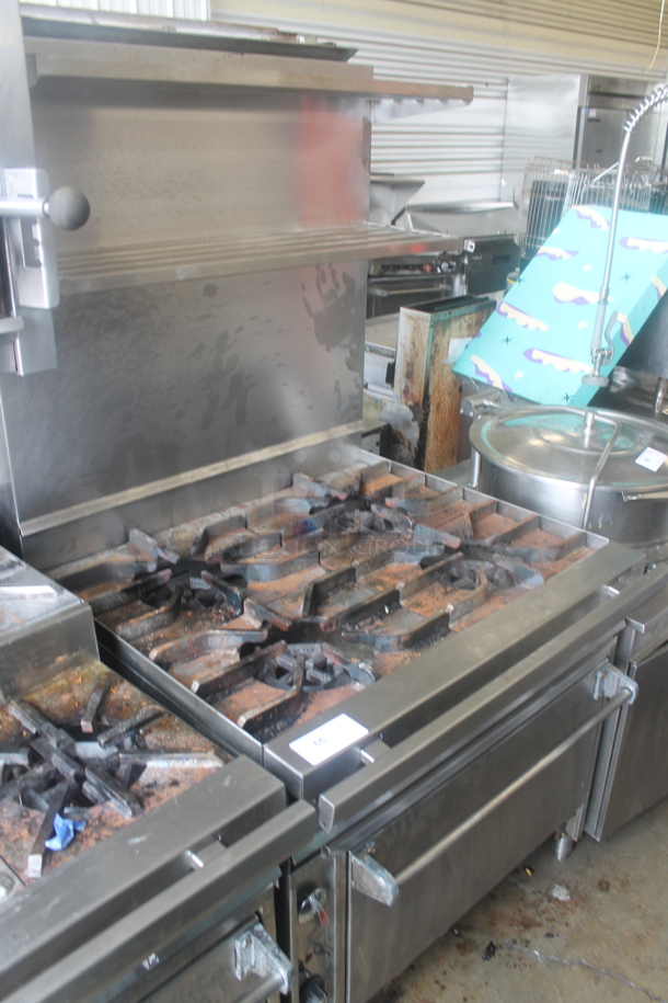 Stainless Steel Commercial Natural Gas Powered 4 Burner Range w/ Oven, 2 Tier Over Shelf and Back Splash. - Image 2 of 6