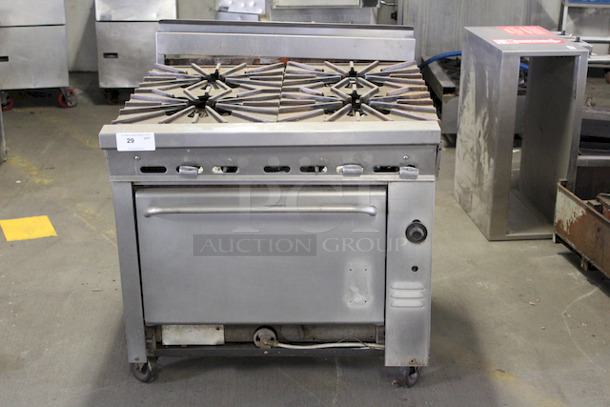 AMAZING! Commercial Stock Pot 4 Burner Range With Oven Base On Commercial Casters. 430.00lbs.
