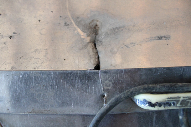 OUTSTANDING! True TSSU-48-18M-B Mega-Top Solid Door Sandwich/Salad Unit On Commercial Casters. 115v/60hz/1ph/15amps. TESTED! Turns On, Blows COLD Air. Unit Was Plugged In A Running While Photographing. 48-3/8x34-1/8x40-3/8 Normal wear and tear, minor cosmetic crack in lid, Dust From Storage.	 - Image 7 of 7