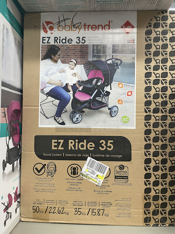 MASSIVE LOT! (3) Little Tikes 2-In-1 Snug & Secure Swings – 1 Blue, 2 Pink; (17) Nuby Water Resistant Baby Bibs (assorted colors); (1) Graco “Caden Fashion” Comfy Cruiser™ Travel System With Snugride® 30; (1) Allen YOOGO CZ2 Convertible Cargo Trailer → Handy Pull Cart,  (1) Delta Children Sweet Slumber Bassinet, (1) Chicco LullaGo Portable Bassinet, (1) Chicco NextFit Sport Convertible Car Seat, (2) Evenflo Omni Plus Modular Travel System – Includes LITEMAX Rear-Facing Infant Car Seat, (1) Baby Trend EZ Ride Girl 35 - Includes NEW 4-35 Ibs Infant Car Seat , (1) Evenflo Nurture Infant Car Seat Base. 11x Your Bid - Image 7 of 12