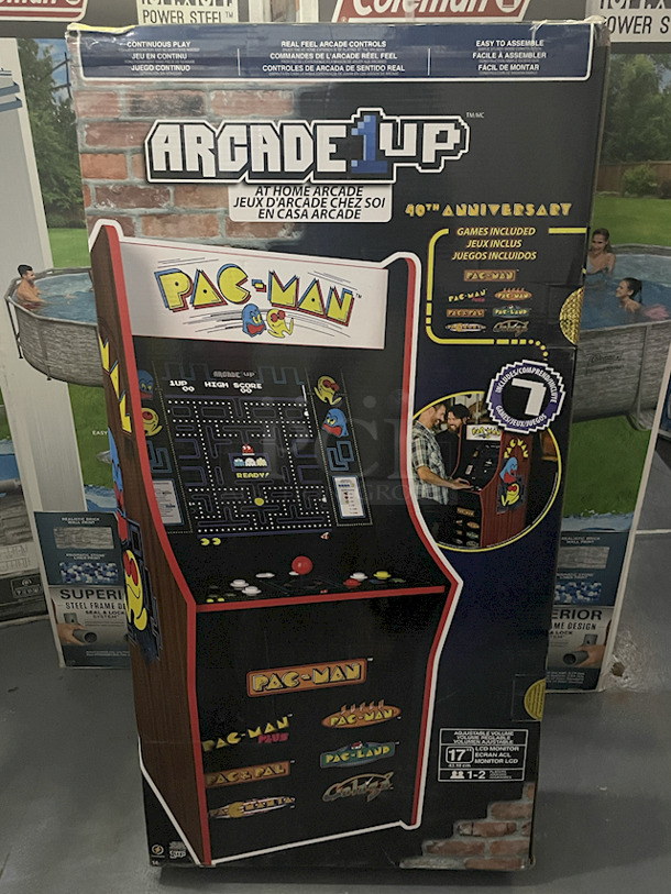 Arcade1UP 40th Anniversary Pac Man At Home Arcade. Games: Pac-Man, Pac-Man Plus, Pac & Pal, Pac-Land, Pacmania, Galaga, Super Pac-Man. Included In The Box: Arcade Cabinet (45.8" H) • 17" LCD Screen • Controller Deck With Preassembled Buttons • Deck Protector • Power Adapter • Instruction Manual - Image 1 of 4