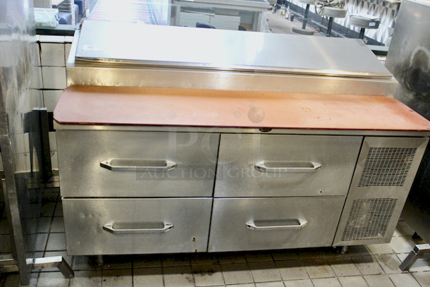 Randell 4 Drawer Pizza/Sandwich Prep-table. Turns on. Gets Down To Temperature. 
68x33x43-1/2