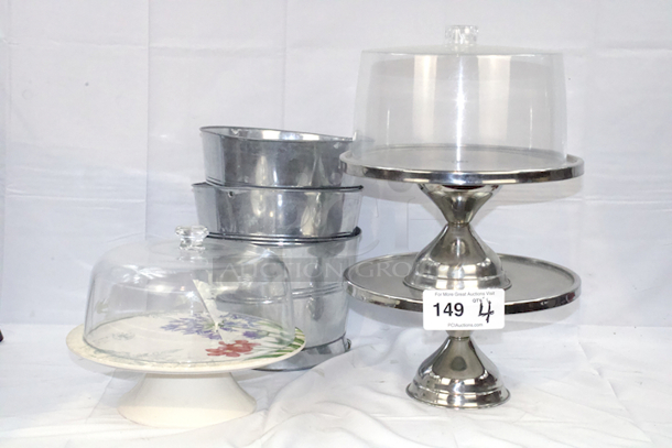 BEAUTIFUL! Cake And Champaign Set. (3) Cake Dishes With (1) Glass Lid, (1) Plastic Lid, (3) Ice Buckets For Chilling Champaign Or Other Drinks. 4x Your Bid.  - Image 1 of 7
