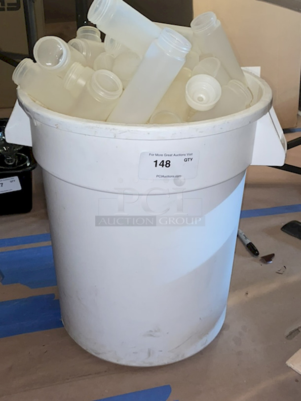 HUGE! 20 Gallon / 320 Cup White Round Ingredient Storage Bin Filled Approximately 12-24oz Squeeze Bottles - Image 1 of 2