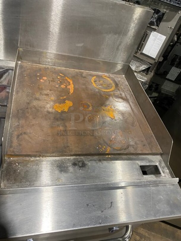 Patriot Commercial Natural Gas Powered 6 Burner Stove With Flat Griddle! Flat Griddle Has Side Splashes! With Raised Back Splash! With 2 Oven Underneath! Metal Oven Racks! All Stainless Steel! On Casters! WORKING WHEN REMOVED! - Image 7 of 12