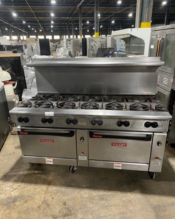 Vulcan Commerical Natural Gas Powered 12 Burner Stove! With Raised Back Splash And Salamander Shelf! With 2 Oven Underneath! All Stainless Steel! On Casters! WORKING WHEN REMOVED! Model: G72SS1AA SN: 659011300