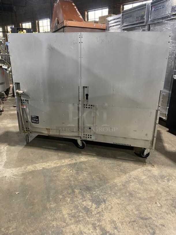 Vulcan Commerical Natural Gas Powered 12 Burner Stove! With Raised Back Splash And Salamander Shelf! With 2 Oven Underneath! All Stainless Steel! On Casters! WORKING WHEN REMOVED! Model: G72SS1AA SN: 659011300 - Image 3 of 11