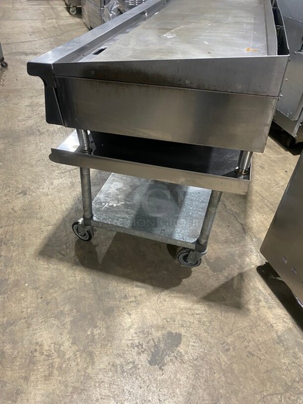 WOW! Garland Heavy Duty Commercial Countertop Gas Powered Flat Griddle! 1 Inch Thick Plate!  With Back And Side Splashes! On Equipment Stand! With Storage Space Underneath! All Stainless Steel! On Casters! Working When Removed! - Image 3 of 8