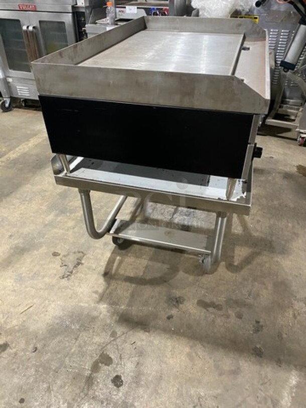 WOW! NEW! NEVER USED! Garland Commercial Countertop Electric Powered Flat Top Griddle! With Back And Side Splashes! On Legs! On Equipment Stand! All Stainless Steel! On Casters! Model: E2448G SN: 0404ME0033 208V 60HZ 3 Phase - Image 3 of 10