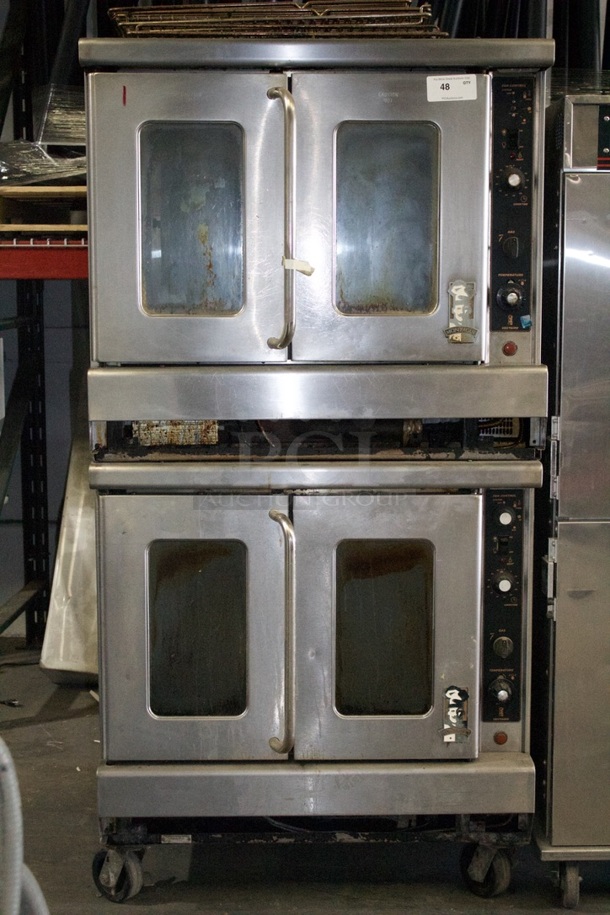 Montague Double Stack Convection Oven On Commercial Casters.`