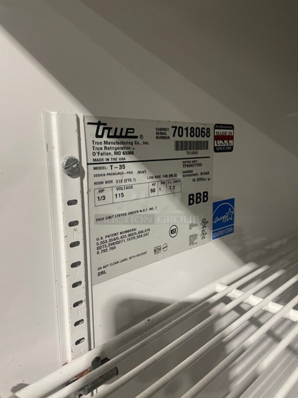 NICE! True Commercial 2 Door Reach In Refrigerator! With Poly Coated Racks! All Stainless Steel! On Casters! 115V 1 Phase! Model: T-35 SN: 7018068! - Image 8 of 10