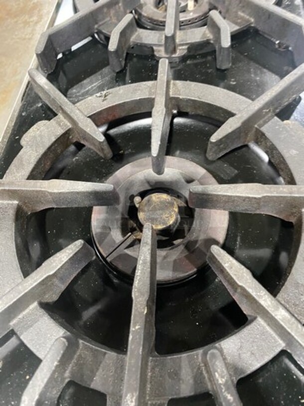 AMAZING! ALL ONE MONEY! Wolf Commercial Gas Powered 6 Burner Stove! With Center Mini Flat Top Griddle! With 1 Full Size & 1 Mini Oven Underneath! With Ventilation Hood System! All Stainless Steel! - Image 6 of 12