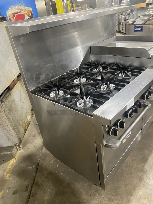 BEAUTIFUL! GARLAND All Stainless Steel Natural Gas Powered 6 Burner Range W/ Raised Right Side Flat Top W/ Cheese Melter! With 2 Ovens W/ Metal Racks! With Raised Over Back Splash & Slamander Shelf! On Commercial Casters! Working When Removed! - Image 2 of 9