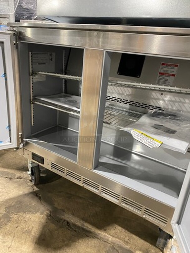 SWEET! NEW! OUT OF THE BOX! Beverage Air Commercial 2 Door Lowboy/Worktop Cooler! With Poly Coated Racks! All Stainless Steel! On Casters! Model: UCR34HC SN: 13402181 115V 60HZ 1 Phase - Image 5 of 9