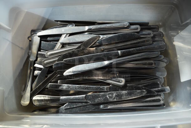 ALL ONE MONEY! Lot of Metal Knives in Clear Poly Bin w/ White Lid