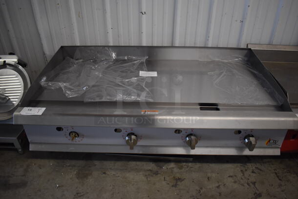 BRAND NEW SCRATCH AND DENT! CPG 351GTCPG48NL Stainless Steel Commercial Countertop Natural Gas Powered Flat Top Griddle w/ Thermostatic Controls. 120,000 BTU. 48x30x16