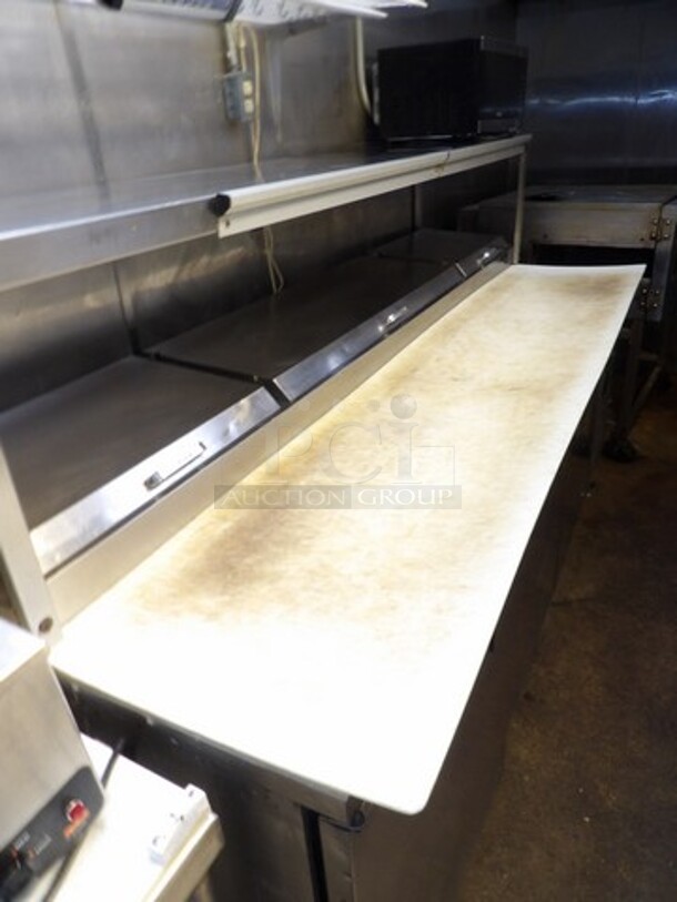 True 3-Door Stainless Pizza/Sandwich Prep Table W/Overhead Shelf. 
TESTED AND WORKING
Model TPP-93
Single Phase - Image 3 of 7