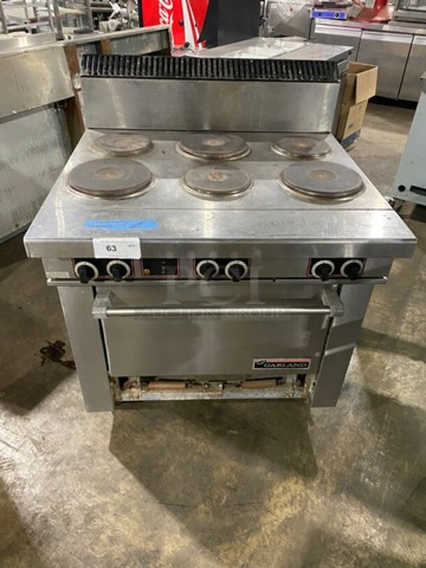 Garland Electric Powered 6 Burner Range! With Full Size Oven Underneath! With Back Splash! All Stainless Steel Body! On Casters! Model: SS686 SN: 0311RF0023