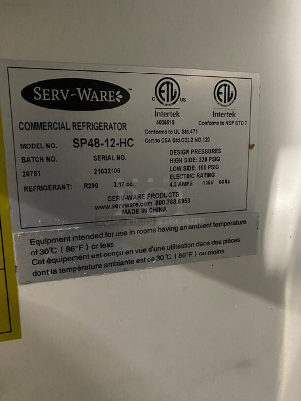 2021 Serv-Ware Prep Table With Commercial Cutting Board And 2 Doors Underneath!  w/ 2 Tier Over Shelf on Commercial Casters! Working When Removed! MODEL SP4812HC SN:21032106  - Image 8 of 12