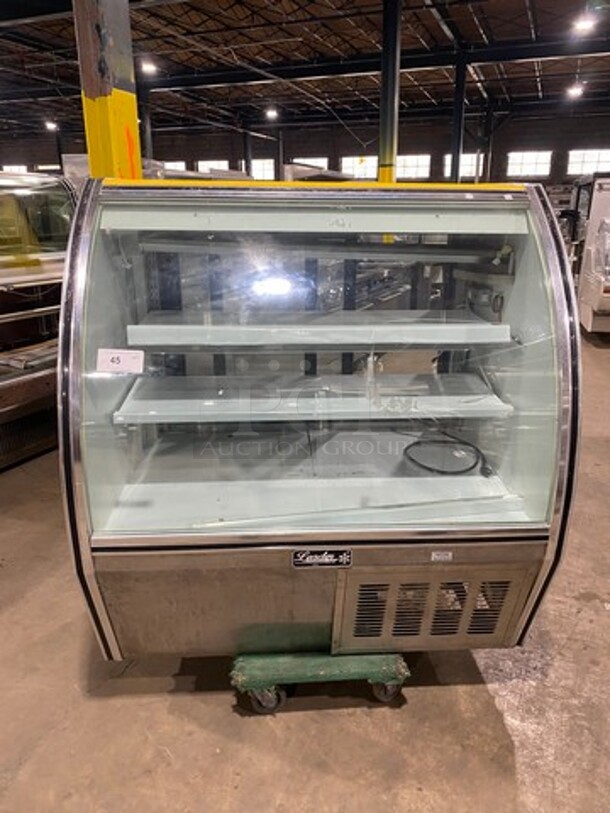 2010 Leader Commercial Refrigerated Bakery Display Case Merchandiser! With Curved Front Glass! With Rear Access Doors! Stainless Steel Body! Model: RHDL48 SN: PT10M1682D 115V 60HZ 1 Phase - Image 1 of 9