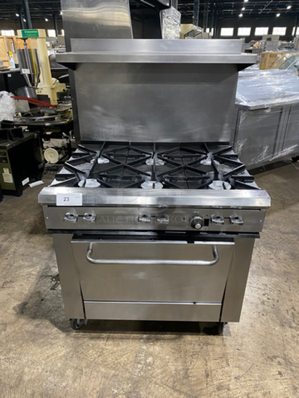NICE! Southbend Commercial Gas Powered 6 Burner Stove! Model X336D Serial 09A81983! With Raised Back Splash And Salamander Shelf! With Oven Underneath! All Stainless Steel! On Casters!