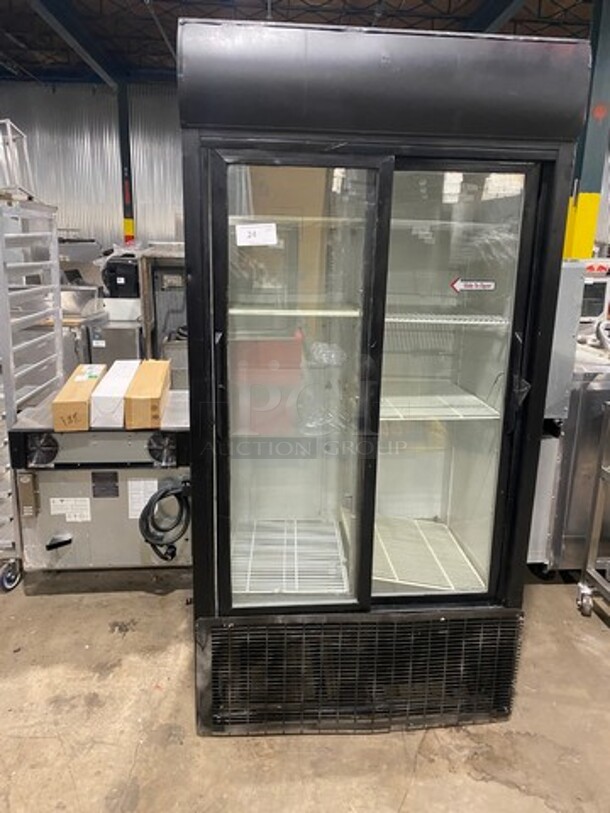 True Commercial 2 Sliding Door Reach In Refrigerator Merchandiser! With View Through Doors! With Poly Coated Racks! Model: GDM33 SN: 13089041 115V 60HZ 1 Phase