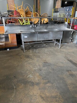 Commercial 3 Compartment Dish Washing Sink! With Overhead Shelf! With Jet Spray Assembly! With Dual Side Drain Board! With Back Splash! All Stainless Steel! On Legs!