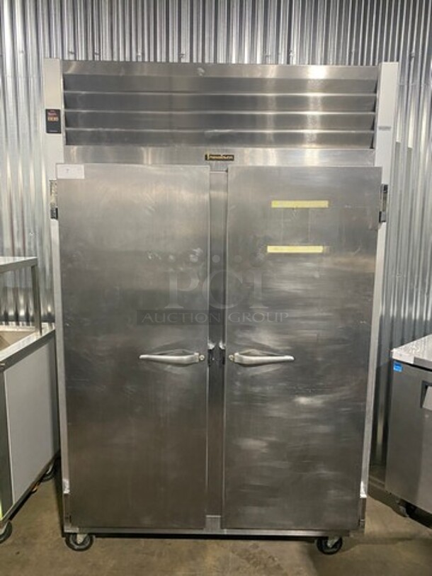 Traulsen Commercial 2 Door Reach In Refrigerator! With Poly Coated Racks! All Stainless Steel! On Casters! Model: G20010 SN: T36622J06! 115V 60HZ 1 Phase!