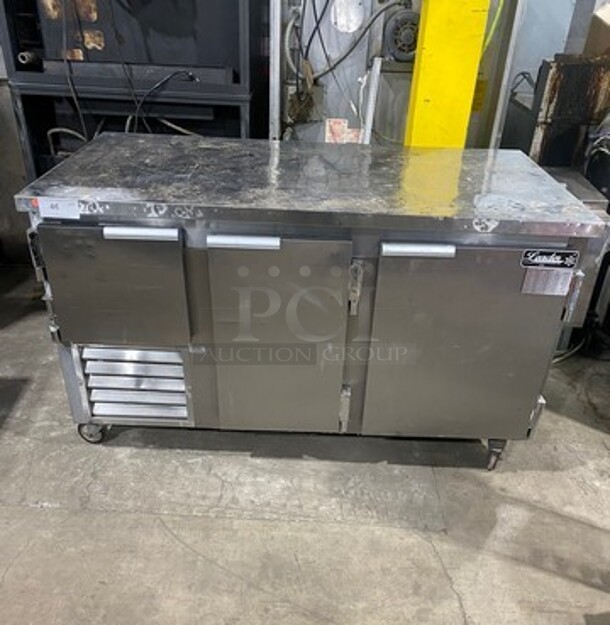 COOL! Leader Commercial 3 Door Lowboy/ Worktop Cooler! With Poly Coated Racks! All Stainless Steel! On Casters! Model: LB60SC SN: PU05C0202 115 Volts, 1 Phase 