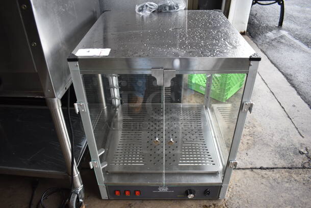 BRAND NEW SCRATCH AND DENT! 2022 Carnival King 382HPW18D2S Stainless Steel Commercial Countertop Display Warmer Merchandiser. Has Broken Shelf Hangers. 120 Volts, 1 Phase. 22.5x23x28. Tested and Working!