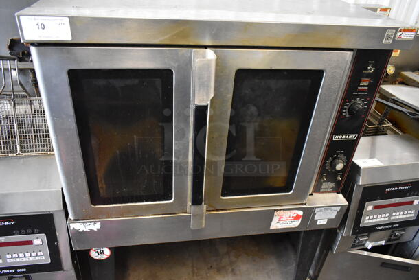 Hobart HGC5 Stainless Steel Commercial Propane Gas Powered Full Size Convection Oven w/ View Through Doors, Metal Oven Racks and Thermostatic Controls on Metal Legs.  - Image 2 of 6