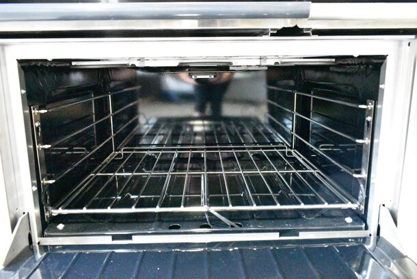 BRAND NEW SCRATCH AND DENT! 2023 Garland SS686 Stainless Steel Sentry Series 6 Sealed Burner Electric Restaurant Range with Standard Oven. 208 Volts, 3 Phase.  - Image 8 of 11
